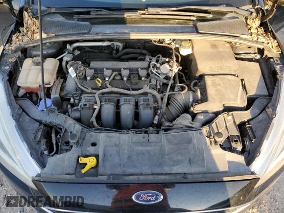 2017 Ford Focus SE with VIN 1FADP3F25HL219608, listed as a Copart auction lot 56559925 with 100,207 mi miles and Salvage title. Bid and sale history available at DreamBid. Image 11.