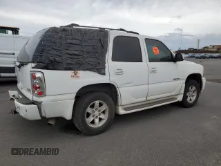 2005 GMC Yukon Denali z VIN 1GKEK63UX5J194771, wystawiony jako Copart lot #53170035 z przebiegiem 175 910 mil mil oraz Tytuł czysty. Historia ofert i sprzedaży dostępna na DreamBid. Obrazek 3.