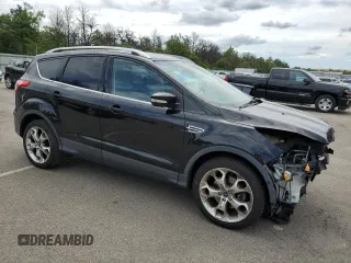 2016 Ford Escape Titanium с VIN 1FMCU9J93GUB78356, выставлен на аукционе Copart как лот 64264715 с пробегом 95 775 миль миль и Списание • Salvage title. История ставок и продаж доступна на DreamBid. Изображение 4.