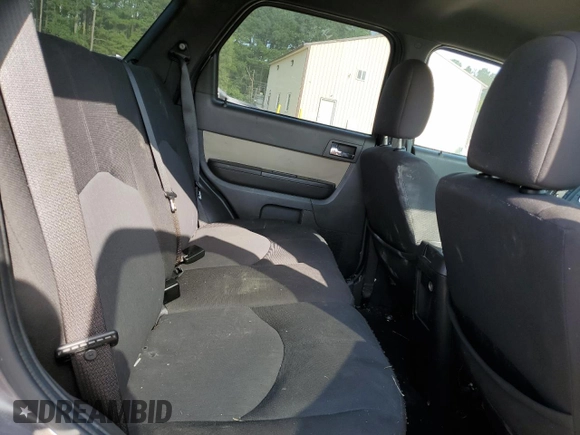 2009 Mercury Mariner with VIN 4M2CU81G69KJ18657, listed as a Copart auction lot 68869154 with 186,290 mi miles and Salvage title. Bid and sale history available at DreamBid. Image 12.