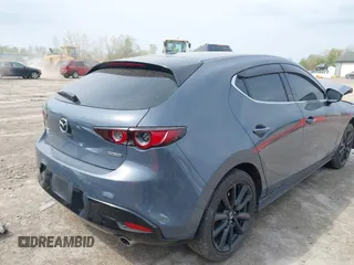 2020 Mazda 3 Premium with VIN JM1BPBNM3L1171285, listed as a IAAI auction lot 42097340 with 50,799 mi miles and . Bid and sale history available at DreamBid. Image 4.