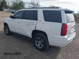 2017 Chevrolet Tahoe LT with VIN 1GNSKBKCXHR350028, listed as a IAAI auction lot 41684954 with 117,261 mi miles and . Bid and sale history available at DreamBid. Image 3.