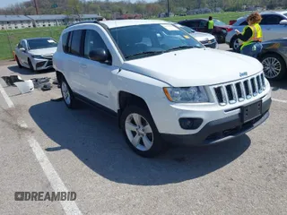 2011 Jeep Compass Latitude with VIN 1J4NT1FB2BD236439, listed as a IAAI auction lot 41935842 with 164,893 mi miles. Bid and sale history available at carsss.com. Image 1.