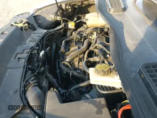 2014 Ford Escape SE with VIN 1FMCU0GX3EUE48085, listed as a IAAI auction lot 43369705 with 159,475 mi miles and . Bid and sale history available at DreamBid. Image 14.