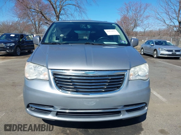 2013 Chrysler Town & Country Touring with VIN 2C4RC1BG9DR777819, listed as a IAAI auction lot 41824692 with 138,702 mi miles. Bid and sale history available at carsss.com. Image 12.