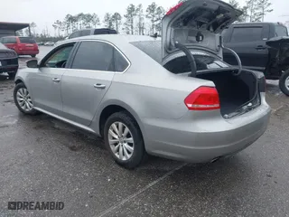2012 Volkswagen Passat SE w/Sunroof with VIN 1VWBH7A36CC077412, listed as a IAAI auction lot 41651796 with 113,259 mi miles. Bid and sale history available at carsss.com. Image 3.