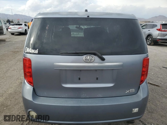 2010 Scion xB with VIN JTLZE4FE3A1100385, listed as a Copart auction lot 53754515 with 99,701 mi miles and Salvage Title. Bid and sale history available at DreamBid. Image 6.