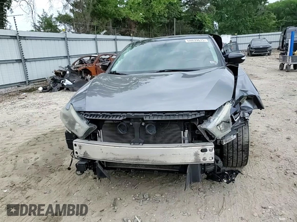2016 Nissan Maxima SL with VIN 1N4AA6AP0GC379967, listed as a Copart auction lot 60839615 with 107,201 mi miles and Salvage title. Bid and sale history available at DreamBid. Image 13.