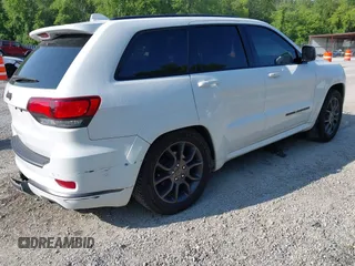 2021 Jeep Grand Cherokee Overland with VIN 1C4RJFCG3MC502165, listed as a IAAI auction lot 42404863 with 100,197 mi miles and . Bid and sale history available at DreamBid. Image 4.