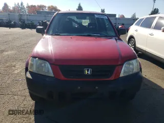 1999 Honda CR-V LX with VIN JHLRD2843XC014579, listed as a Copart auction lot 79394924 with 249,544 mi miles and Salvage Title. Bid and sale history available at carsss.com. Image 5.