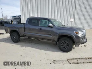 2021 Toyota Tacoma 4WD SR5 with VIN 5TFDZ5BN5MX064934, listed as a Copart auction lot 48400035 with 59,767 mi miles and Salvage Title. Bid and sale history available at carsss.com. Image 4.