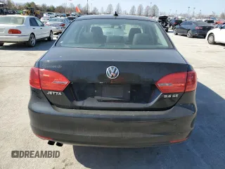 2012 Volkswagen Jetta Sedan SE w/Convenience with VIN 3VWDX7AJ2CM411783, listed as a Copart auction lot 48974555 with 128,209 mi miles and Salvage Title. Bid and sale history available at carsss.com. Image 6.