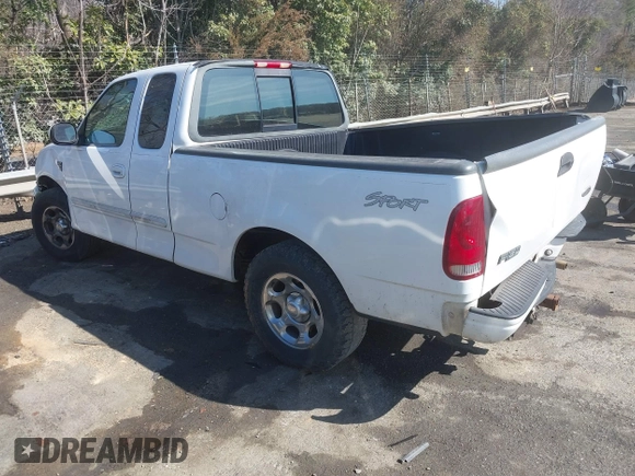 2002 Ford F-150 XL with VIN 1FTRX17L32NA13159, listed as a IAAI auction lot 41653814 with 435,395 mi miles. Bid and sale history available at carsss.com. Image 3.