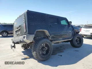 2005 Hummer H2 SUV with VIN 5GRGN23U95H101796, listed as a Copart auction lot 76991574 with 88,204 mi miles and Salvage Title. Bid and sale history available at carsss.com. Image 3.
