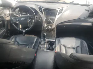 2013 Hyundai Azera с VIN KMHFG4JG5DA204636, выставлен на аукционе Copart как лот 59782945 с пробегом 74 494 миль миль и Списание • Salvage title. История ставок и продаж доступна на DreamBid. Изображение 8.