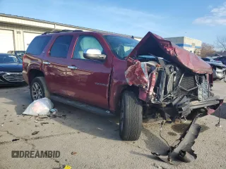 2009 GMC Yukon SLT w/4SA with VIN 1GKFK330X9R207168, listed as a Copart auction lot 85997244 with 123,227 mi miles and Salvage Title. Bid and sale history available at carsss.com. Image 4.