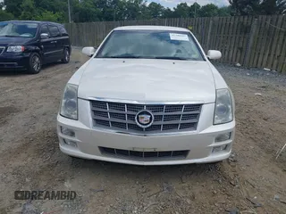 2010 Cadillac STS AWD z VIN 1G6DU6EV4A0102872, wystawiony jako IAAI lot #42348505 z przebiegiem 151 934 mil mil oraz . Historia ofert i sprzedaży dostępna na DreamBid. Obrazek 6.