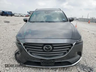 2019 Mazda CX-9 Grand Touring z VIN JM3TCADY9K0300284, wystawiony jako Copart lot #51801365 z przebiegiem 53 550 mil mil oraz Szkoda całkowita • Salvage title. Historia ofert i sprzedaży dostępna na DreamBid. Obrazek 5.