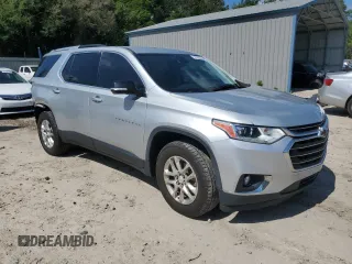 2018 Chevrolet Traverse LT Cloth with VIN 1GNERGKW7JJ282002, listed as a Copart auction lot 61564495 with 105,048 mi miles and Salvage title. Bid and sale history available at DreamBid. Image 4.