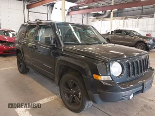 2014 Jeep Patriot Limited with VIN 1C4NJRCB4ED629085, listed as a IAAI auction lot 39414215 with 87,409 mi miles. Bid and sale history available at carsss.com. Image 1.