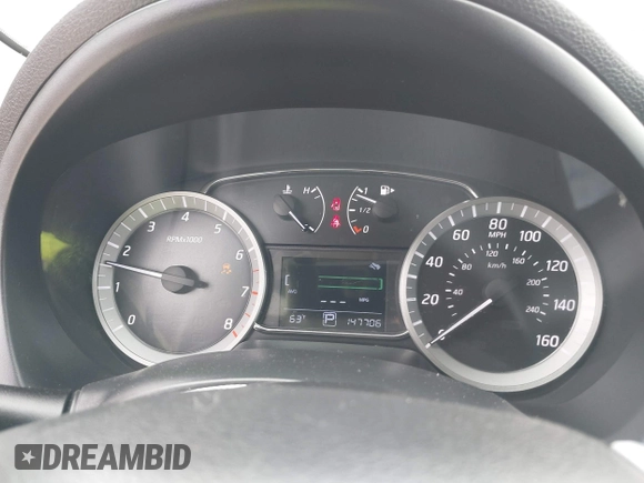 2015 Nissan Sentra SV with VIN 3N1AB7AP4FY381663, listed as a IAAI auction lot 41792516 with 147,706 mi miles and . Bid and sale history available at DreamBid. Image 7.