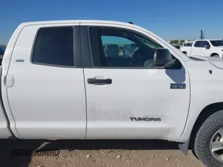 2016 Toyota Tundra 4WD Truck SR with VIN 5TFUW5F1XGX539529, listed as a IAAI auction lot 42044488 with 271,734 mi miles. Bid and sale history available at carsss.com. Image 12.