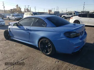 2017 BMW M4 with VIN WBS3U9C57HP970954, listed as a Copart auction lot 84011474 with 56,882 mi miles and Salvage Title. Bid and sale history available at carsss.com. Image 2.