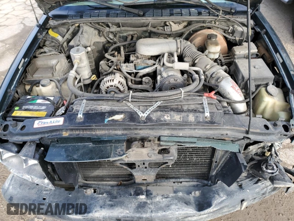 2001 GMC Sonoma SLS 1SG z VIN 1GTCS19W318247147, wystawiony jako Copart lot #83135464 z przebiegiem 292 056 mil mil oraz Szkody całkowita. Historia ofert i sprzedaży dostępna na DreamBid. Obrazek 12.