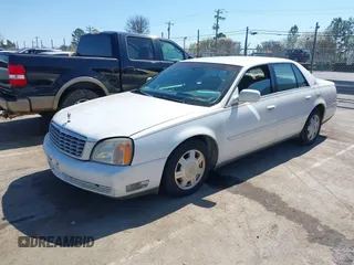 2004 Cadillac DeVille z VIN 1G6KD54Y74U129218, wystawiony jako IAAI lot #41786756 z przebiegiem 167 125 mil mil oraz . Historia ofert i sprzedaży dostępna na DreamBid. Obrazek 2.