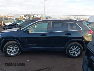 2015 Jeep Cherokee Latitude z VIN 1C4PJMCS0FW512153, wystawiony jako IAAI lot #41649376 z przebiegiem 147 910 mil mil oraz . Historia ofert i sprzedaży dostępna na DreamBid. Obrazek 14.