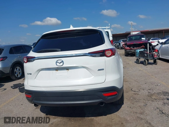 2019 Mazda CX-9 Touring with VIN JM3TCACY7K0314539, listed as a IAAI auction lot 42234361 with 98,299 mi miles and . Bid and sale history available at DreamBid. Image 16.