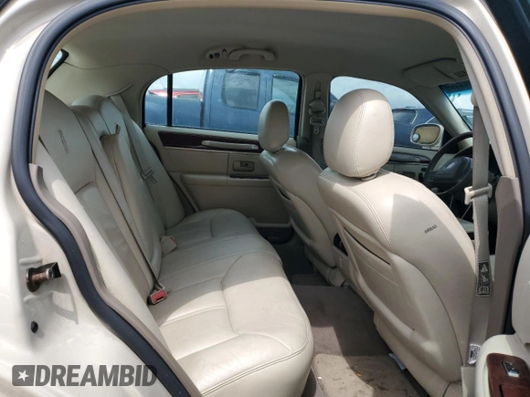 2003 Lincoln Town Car Cartier z VIN 1LNHM83W33Y690270, wystawiony jako Copart lot #51682235 z przebiegiem 118 355 mil mil oraz Szkoda całkowita • Salvage title. Historia ofert i sprzedaży dostępna na DreamBid. Obrazek 10.