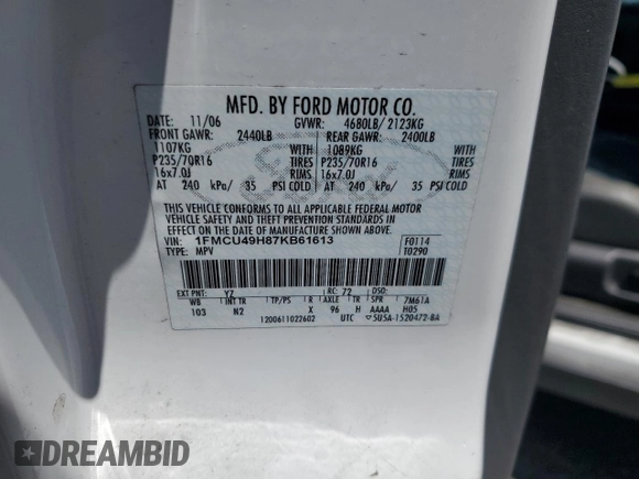 2007 Ford Escape Hybrid with VIN 1FMCU49H87KB61613, listed as a Copart auction lot 58083235 with 129,049 mi miles and Salvage title. Bid and sale history available at DreamBid. Image 14.