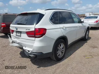 2015 BMW X5 xDrive35i z VIN 5UXKR0C57F0K62448, wystawiony jako IAAI lot #42321842 z przebiegiem 198 839 mil mil oraz . Historia ofert i sprzedaży dostępna na DreamBid. Obrazek 4.