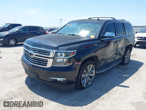 2015 Chevrolet Tahoe LTZ with VIN 1GNSCCKC4FR309152, listed as a IAAI auction lot 42029341 with 187,313 mi miles and . Bid and sale history available at DreamBid. Image 17.