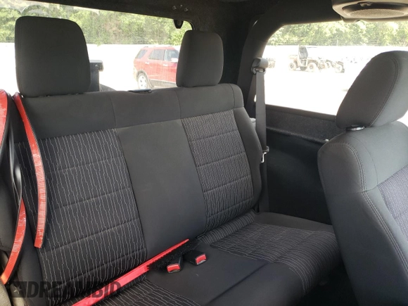2012 Jeep Wrangler Sport z VIN 1C4AJWAG2CL245174, wystawiony jako Copart lot #63161425 z przebiegiem 136 626 mil mil oraz Czysty tytuł • Clean title. Historia ofert i sprzedaży dostępna na DreamBid. Obrazek 11.