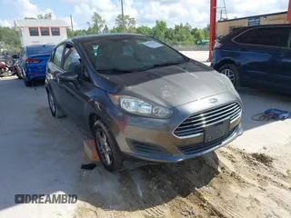 2019 Ford Fiesta SE z VIN 3FADP4EJ9KM156565, wystawiony jako IAAI lot #42164212 z przebiegiem 133 759 mil mil oraz . Historia ofert i sprzedaży dostępna na DreamBid. Obrazek 1.