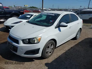 2015 Chevrolet Sonic LT with VIN 1G1JC5SH6F4155187, listed as a IAAI auction lot 42009644 with 220,725 mi miles and . Bid and sale history available at DreamBid. Image 2.