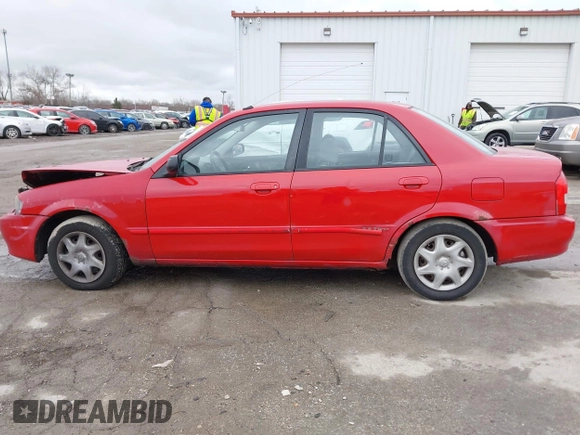 2000 Mazda Protege DX with VIN JM1BJ2224Y0277889, listed as a IAAI auction lot 41160593 with 124,586 mi miles and . Bid and sale history available at DreamBid. Image 14.