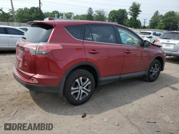 2018 Toyota RAV4 LE with VIN JTMBFREV2JD233808, listed as a Copart auction lot 59021235 with 71,430 mi miles and Salvage title. Bid and sale history available at DreamBid. Image 3.