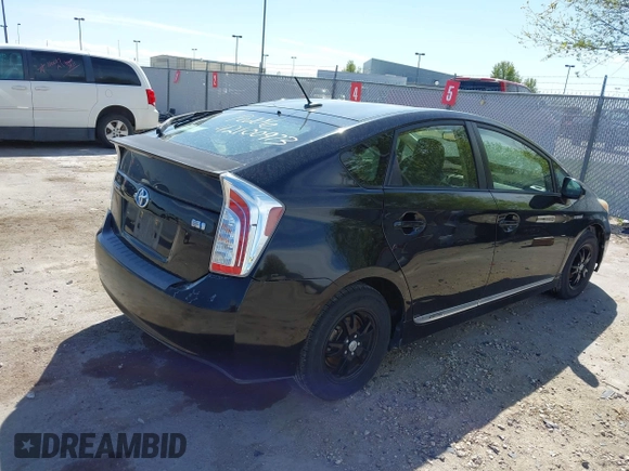 2013 Toyota Prius One with VIN JTDKN3DU9D1682269, listed as a IAAI auction lot 42100973 with 126,058 mi miles. Bid and sale history available at carsss.com. Image 4.