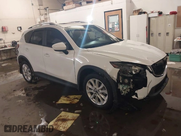 2013 Mazda CX-5 Grand Touring with VIN JM3KE4DE8D0147851, listed as a IAAI auction lot 41570695 with 94,648 mi miles. Bid and sale history available at carsss.com. Image 1.