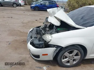 2008 Volkswagen Jetta SE z VIN 3VWRM71K38M176776, wystawiony jako IAAI lot #42244339 z przebiegiem 183 673 mil mil oraz . Historia ofert i sprzedaży dostępna na DreamBid. Obrazek 6.