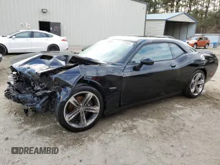 2015 Dodge Challenger R/T with VIN 2C3CDZAT1FH823432, listed as a Copart auction lot 77883964 with 126,929 mi miles and Salvage title. Bid and sale history available at DreamBid. Image 1.