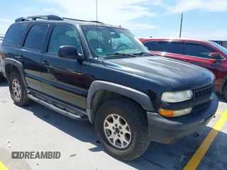 2002 Chevrolet Tahoe Z71 z VIN 1GNEK13Z32R132286, wystawiony jako IAAI lot #42203227 z przebiegiem 253 828 mil mil oraz . Historia ofert i sprzedaży dostępna na DreamBid. Obrazek 1.