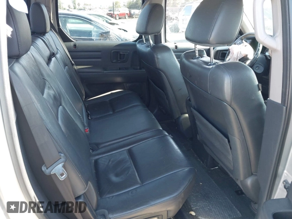 2012 Honda Ridgeline RTL with VIN 5FPYK1F56CB457687, listed as a IAAI auction lot 42582331 with 96,357 mi miles and . Bid and sale history available at DreamBid. Image 8.