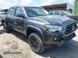 2021 Toyota Tacoma SR z VIN 3TMCZ5AN2MM392590, wystawiony jako IAAI lot #42178072 z przebiegiem 42 542 mil mil oraz . Historia ofert i sprzedaży dostępna na DreamBid. Obrazek 1.