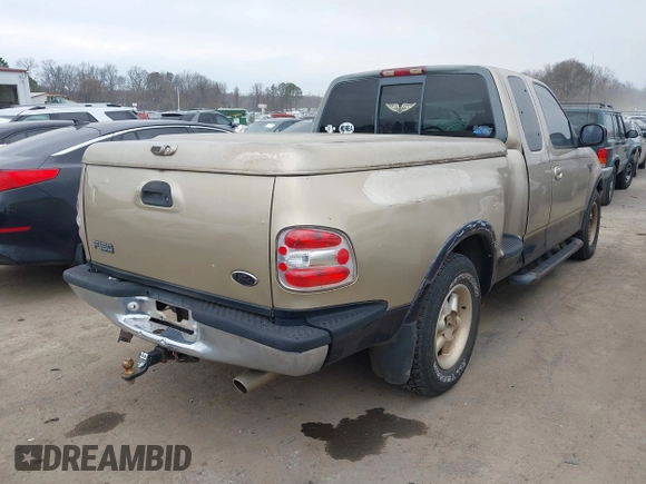 2000 Ford F-150 XL z VIN 1FTRX07W8YKA26326, wystawiony jako IAAI lot #41684242 z przebiegiem 222 808 mil mil oraz . Historia ofert i sprzedaży dostępna na DreamBid. Obrazek 4.
