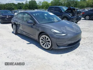 2023 Tesla Model 3 with VIN 5YJ3E1EA3PF434981, listed as a IAAI auction lot 42577864 with 38,500 mi miles and . Bid and sale history available at DreamBid. Image 1.