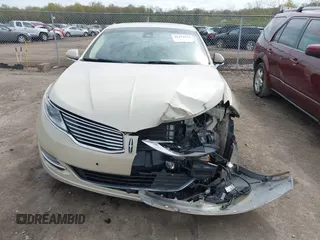 2014 Lincoln MKZ z VIN 3LN6L2JK7ER821385, wystawiony jako IAAI lot #42114154 z przebiegiem 141 480 mil mil oraz . Historia ofert i sprzedaży dostępna na DreamBid. Obrazek 13.